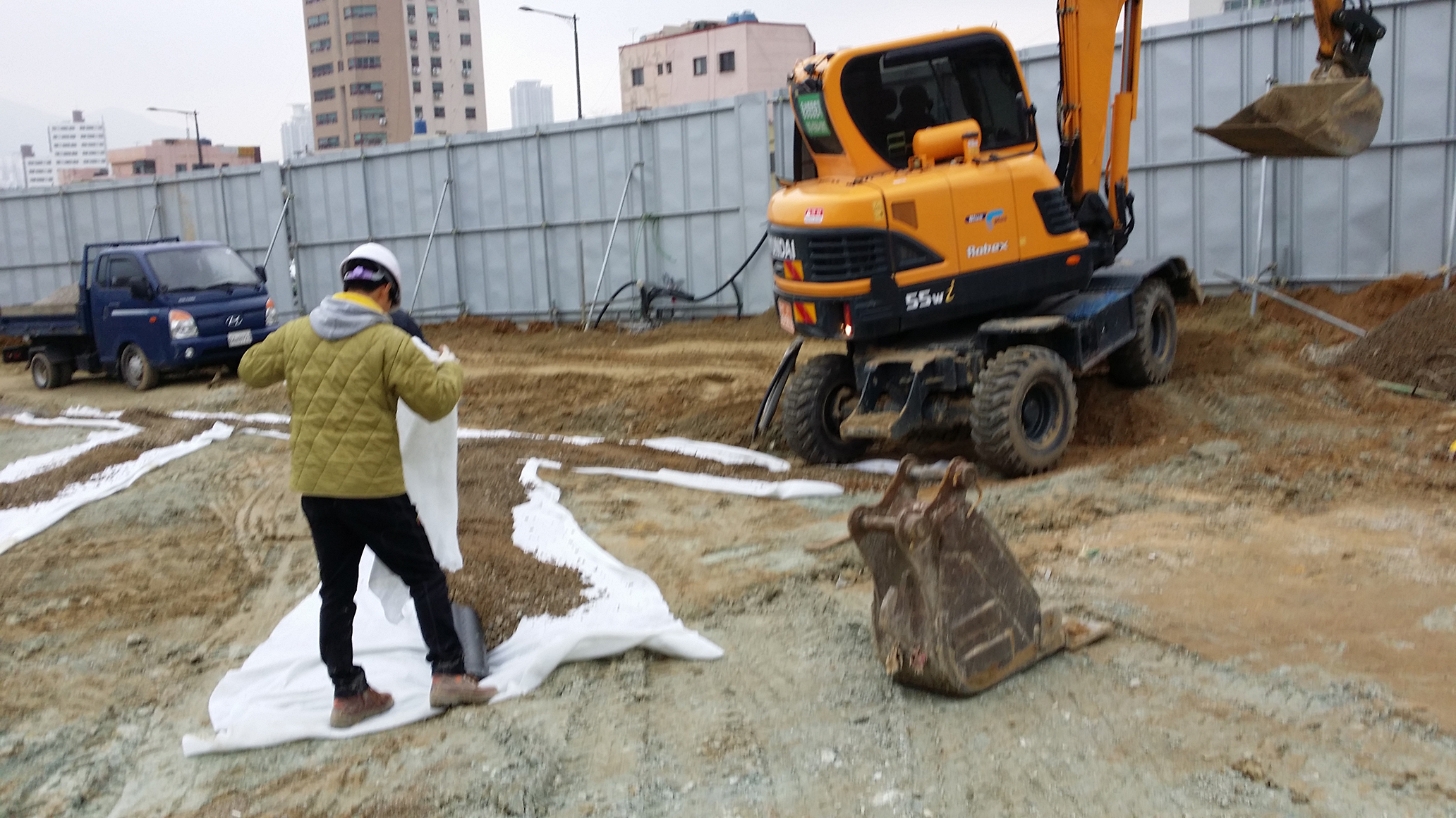 부직포깔기